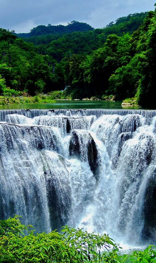 Shifen waterfall in Taiwan is one of the most impressive waterfalls around the world.
