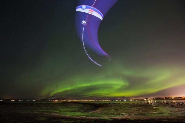 Breathtaking paragliding through Aurora Borealis in Norway by Horacio Llorens.