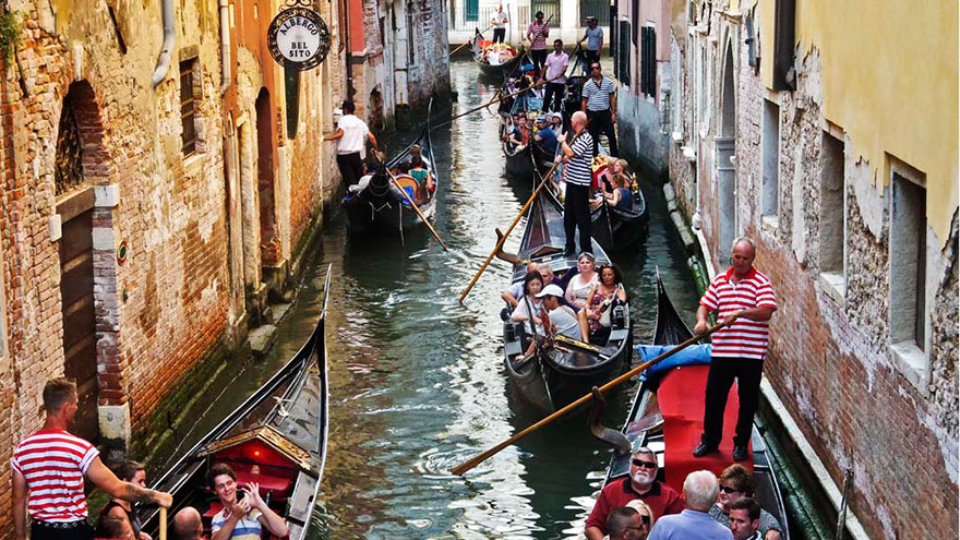 Taking a gondola ride in Venice during high and low season are two different things.